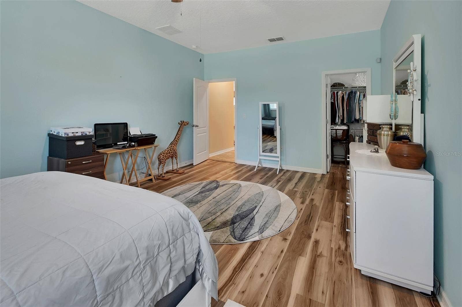 Primary suite has a private foyer entrance and walk-in closet.