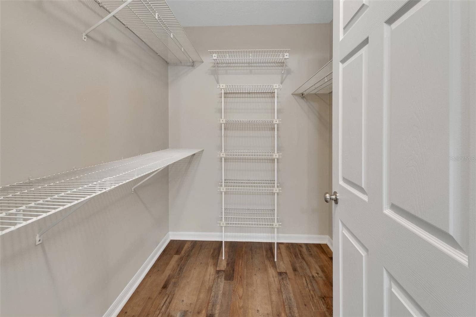 Primary walk-in closet.