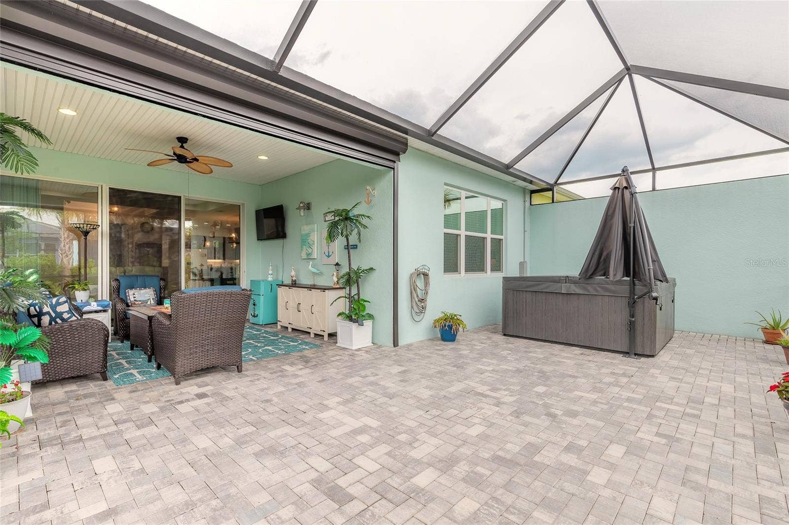 230 SAND BAR LANE, Daytona Beach, FL 32124 Extended lanai with 6-person hot tub and umbrella