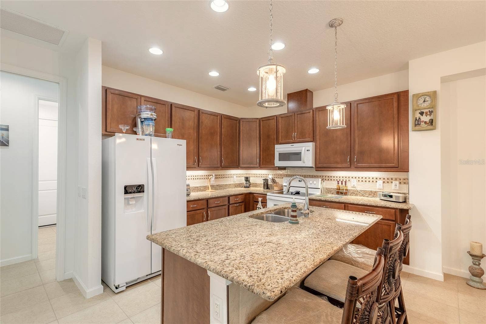 230 SAND BAR LANE, Daytona Beach, FL 32124 42" cabinets & custom tile back splash