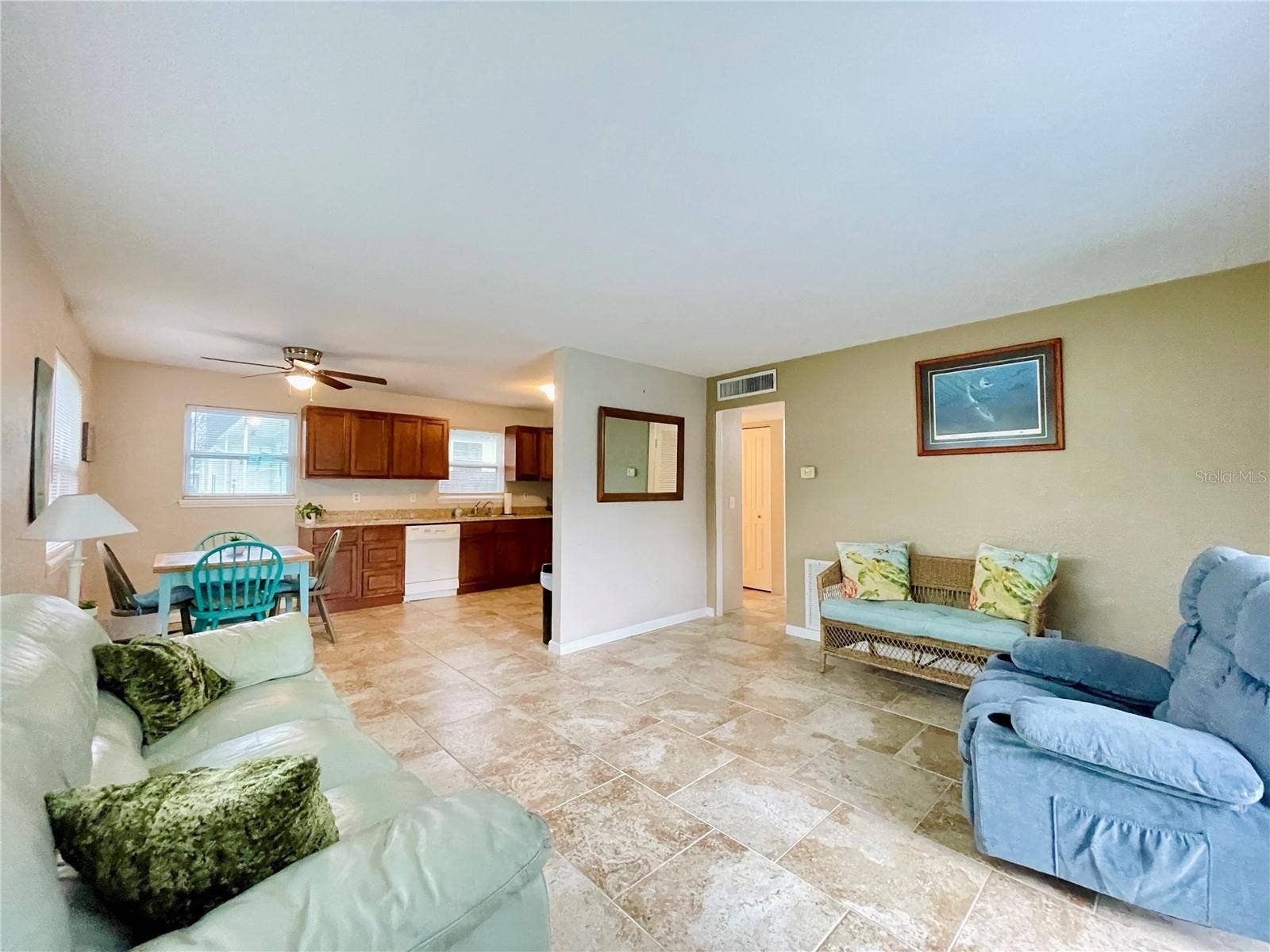 Spacious living area with an open connection to the kitchen and dining space, creating an easy flow for everyday living and entertaining.