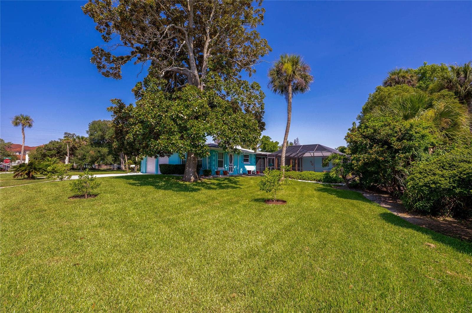 697 JOHN ANDERSON DRIVE, Ormond Beach, FL 32176 Side and rear lawn