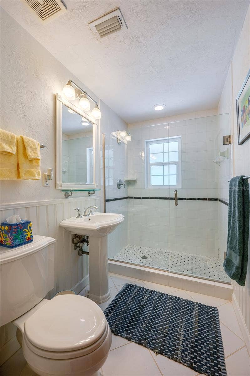 697 JOHN ANDERSON DRIVE, Ormond Beach, FL 32176 Guest bathroom on bedroom side of home