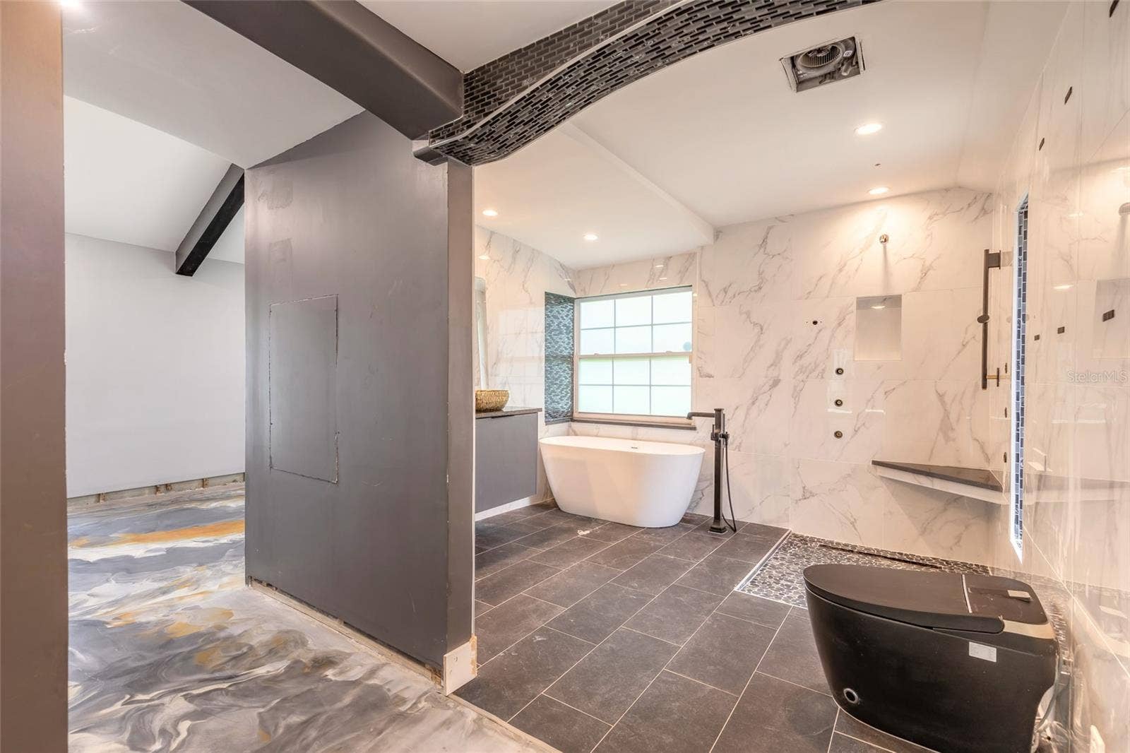 Great Room Bath or Primary Bath 1st Fl