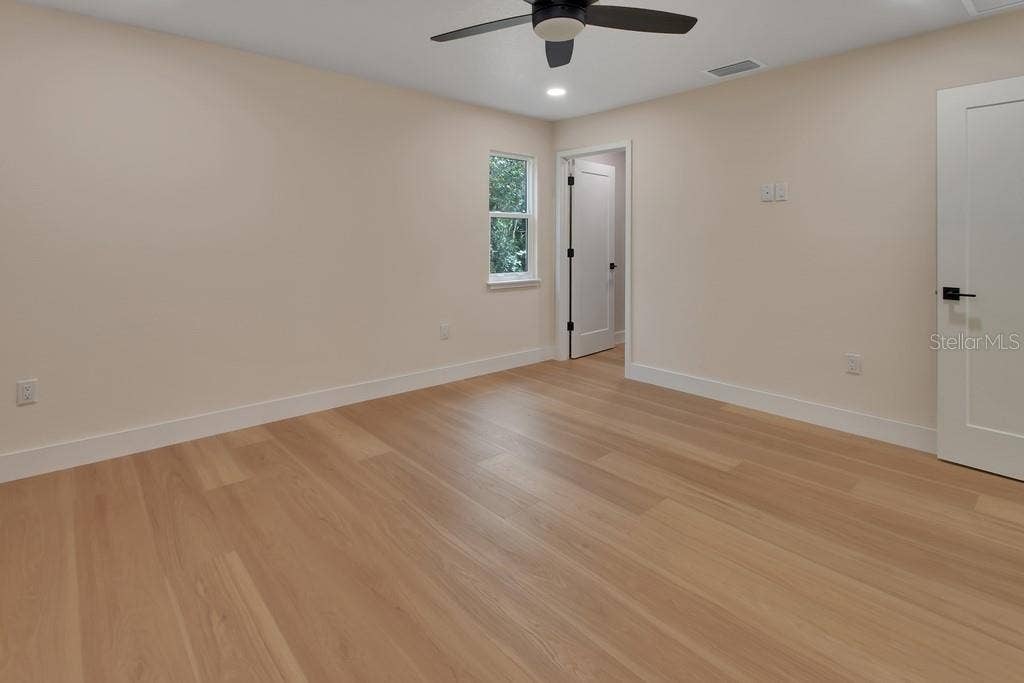 Master bedroom with closet entry