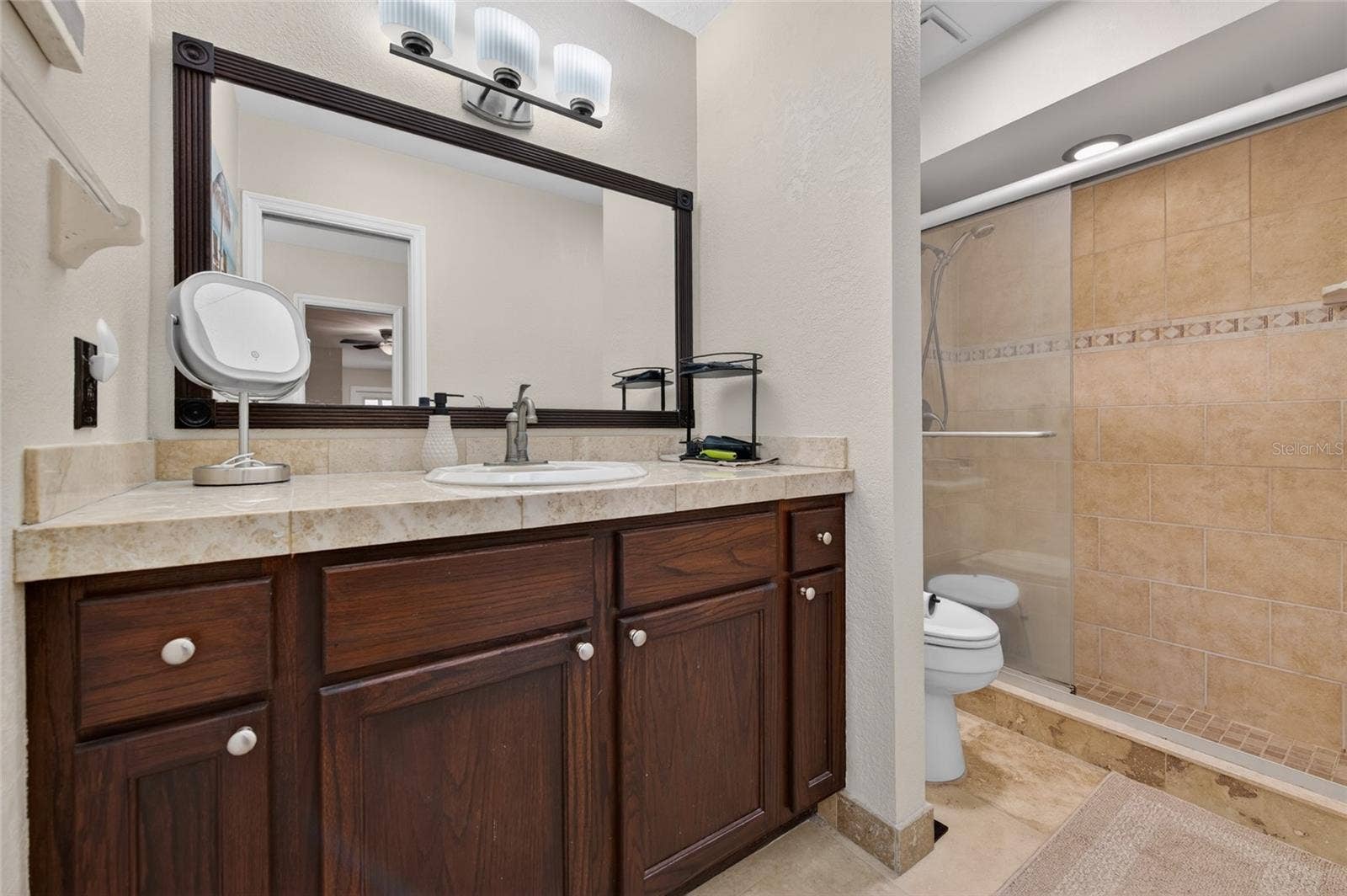 8 MIMOSA TRAIL, Ormond Beach, FL 32174 Primary bath second vanity and Tile Shower