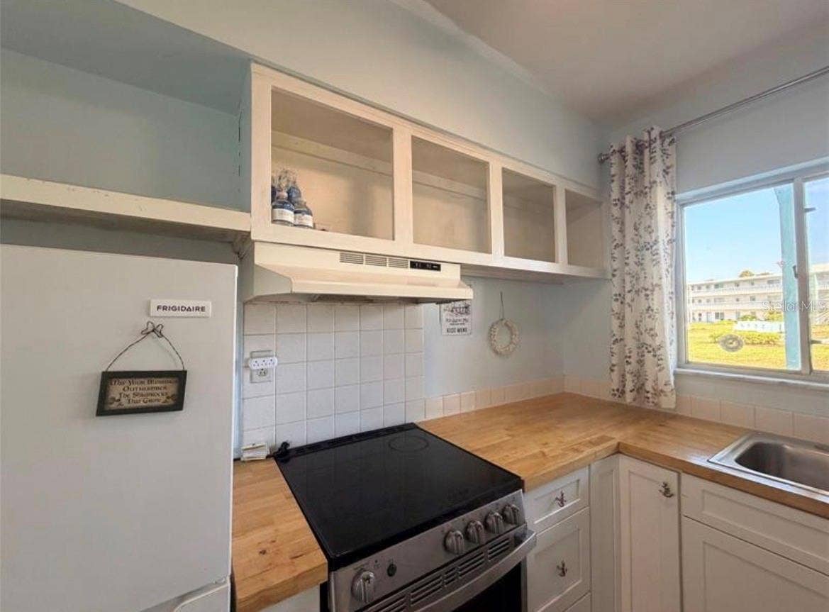 3009 N HALIFAX AVENUE, #2, Daytona Beach, FL 32118 Kitchen 9X7 with open shelving