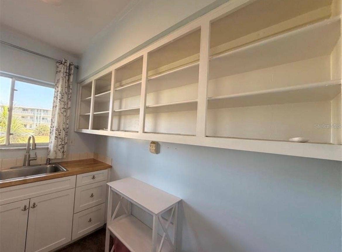 3009 N HALIFAX AVENUE, #2, Daytona Beach, FL 32118 Kitchen 9X7 with open shelving