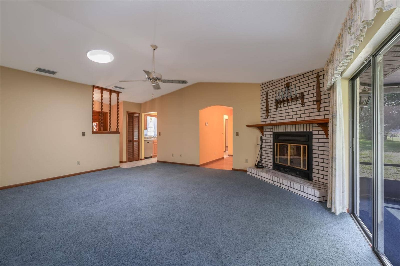 229 GEORGETOWNE BOULEVARD, Daytona Beach, FL 32119 Living Room with Wood-burning Fireplace
