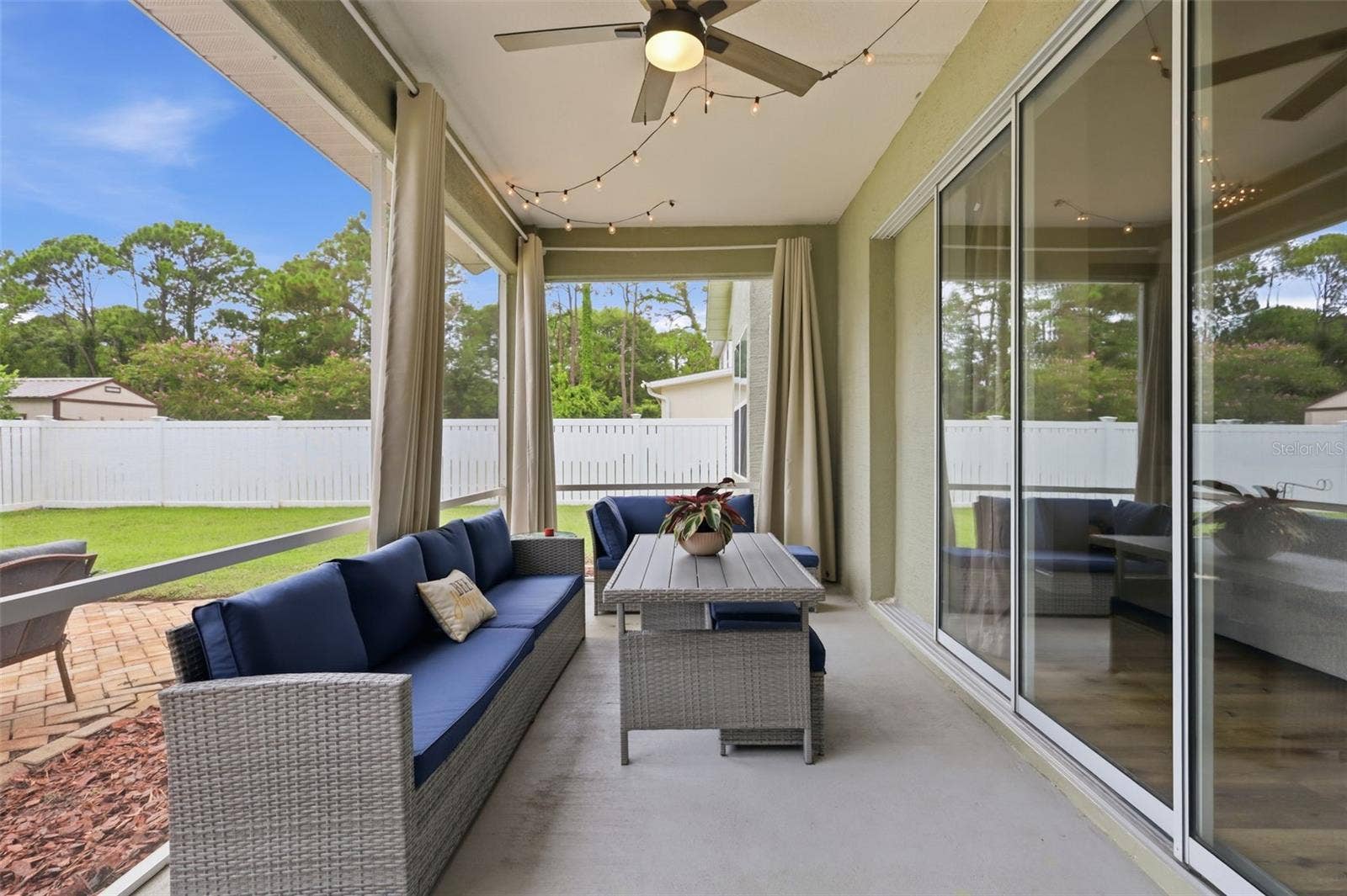 Large screened in the huge, vinyl fenced backyard.