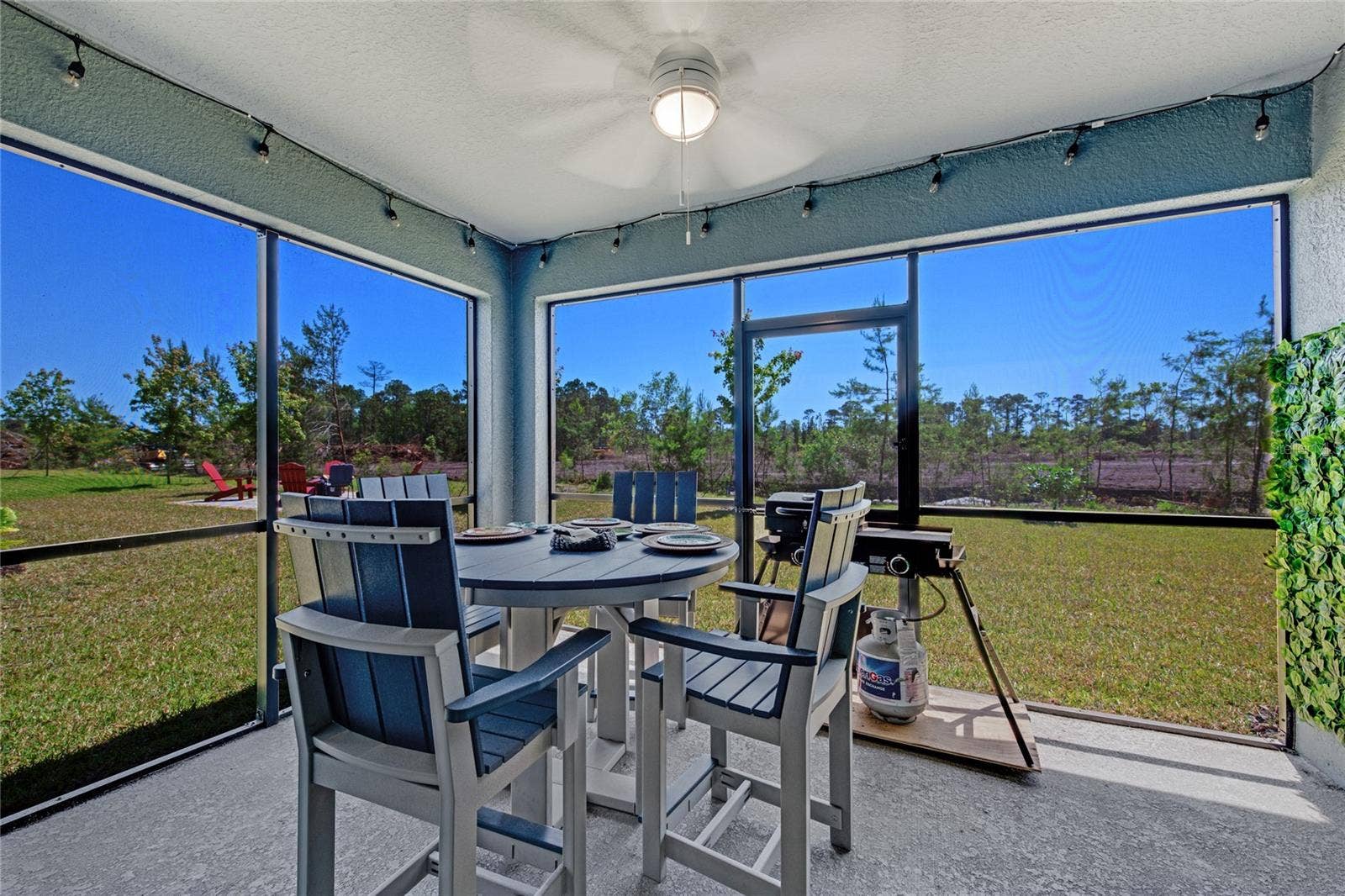 1362 CORK DRIVE, Ormond Beach, FL 32174 enclosed back patio