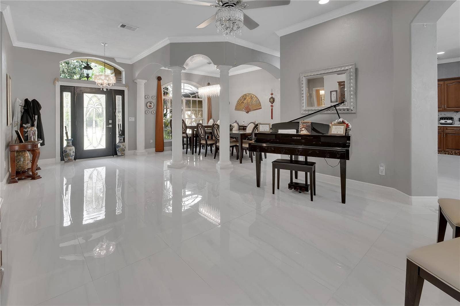VIEW OF LIVING ROOM AND DINING ROOM