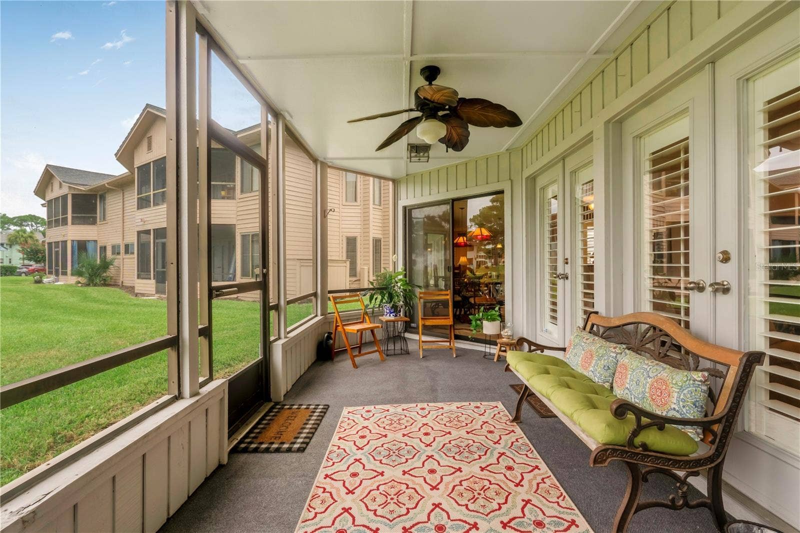150 BLUE HERON DRIVE, #B, Daytona Beach, FL 32119 Screened Lanai