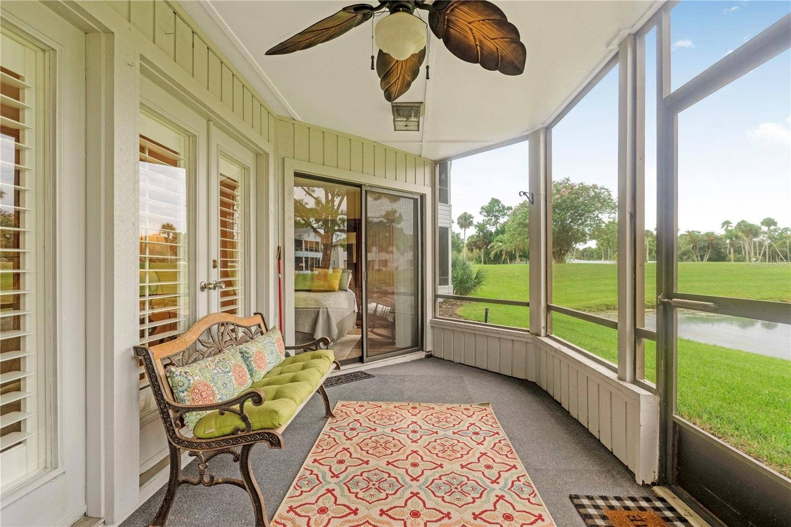 150 BLUE HERON DRIVE, #B, Daytona Beach, FL 32119 Screened Lanai