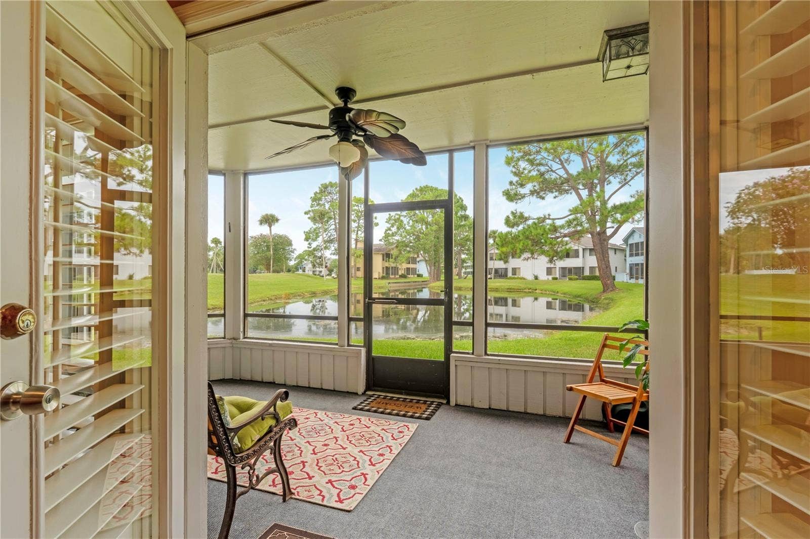 150 BLUE HERON DRIVE, #B, Daytona Beach, FL 32119 Screened Lanai