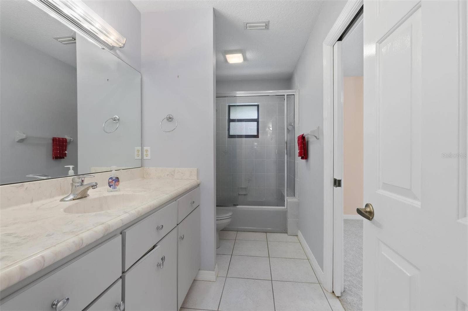 Bathroom #2 (hall).  Additional entrance on right into bedroom #2.