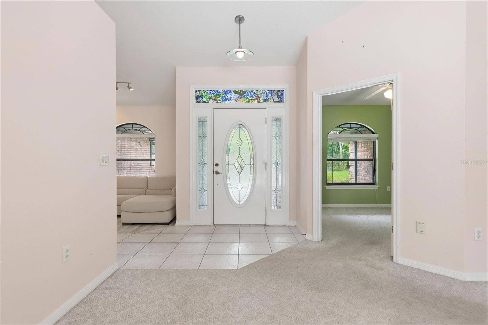 Living room looking to front door.