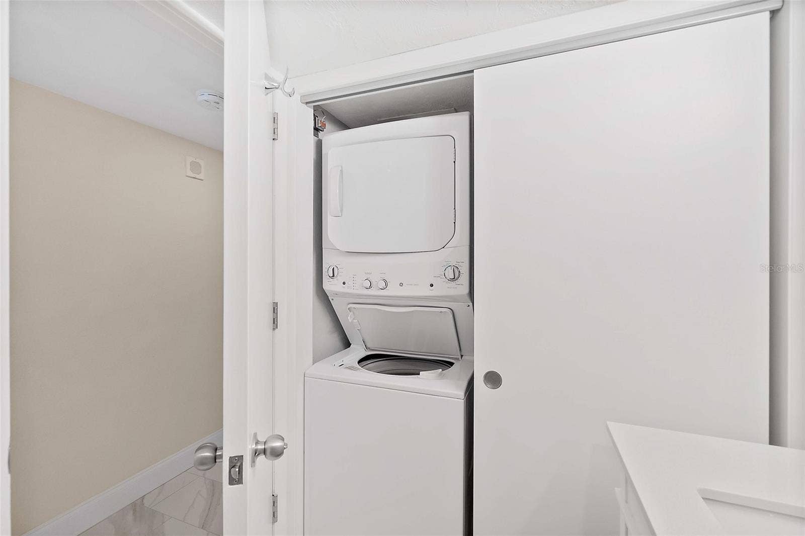 Washer and dryer in guest bath