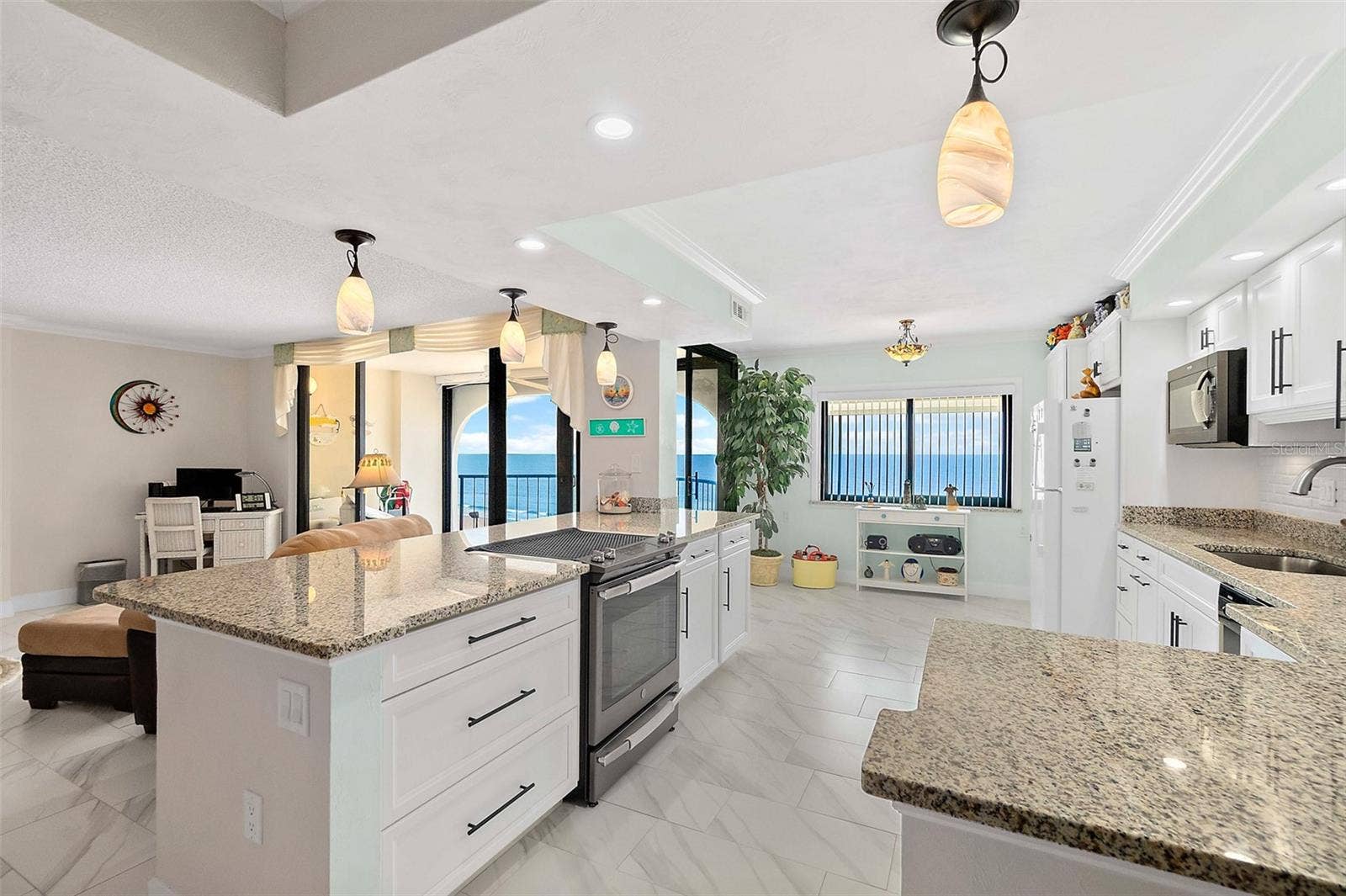 light and bright kitchen with dovetail cabinetry