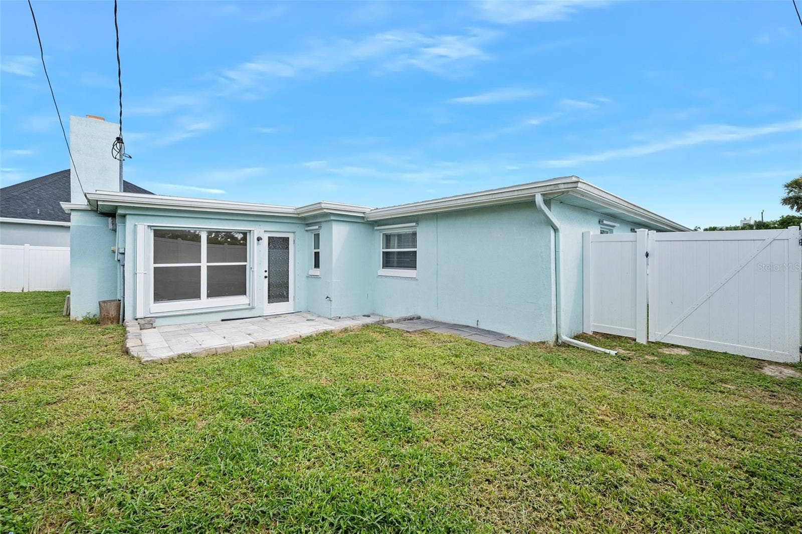 22 PLAZA DRIVE, Ormond Beach, FL 32176 Rear Patio and spacious back yard
