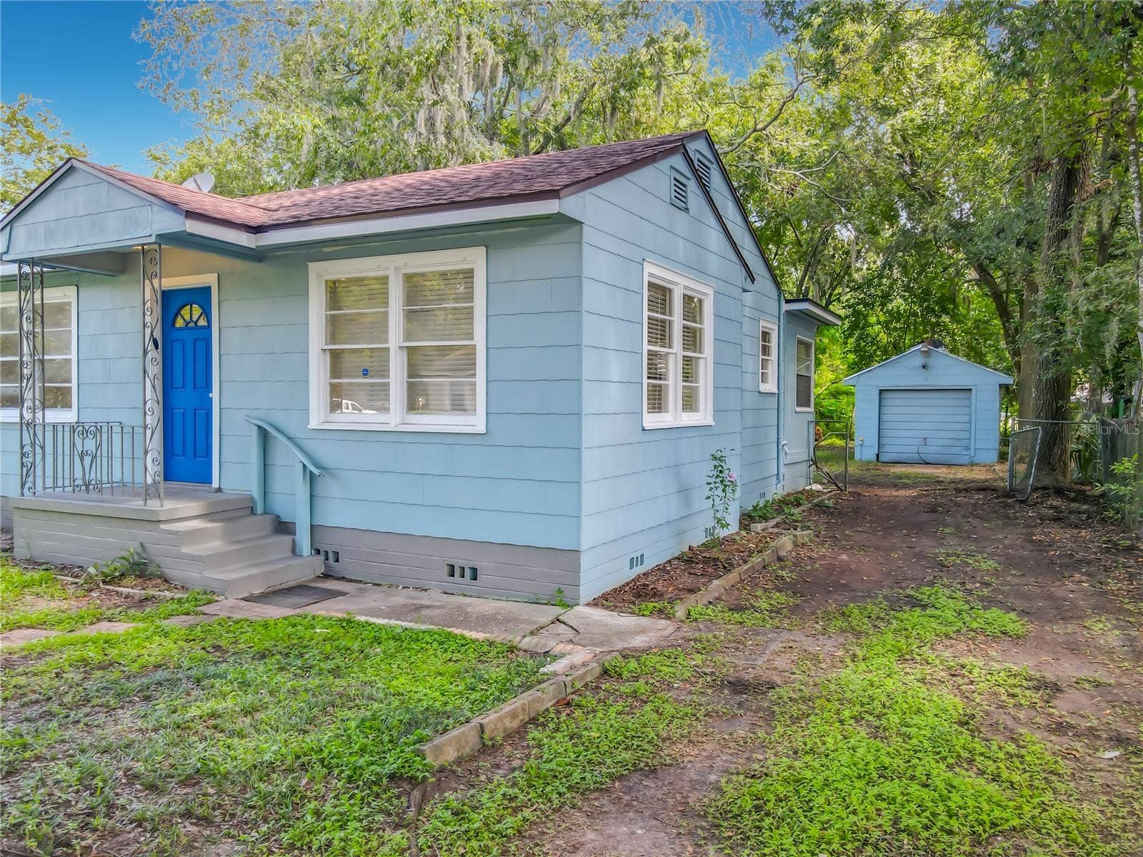 709 EDWARDS STREET, Daytona Beach, FL 32114 driveway to the garage