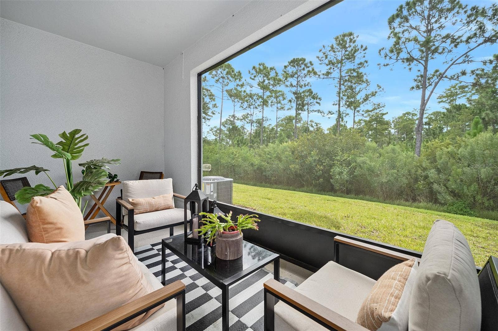 166 REENA DRIVE, Daytona Beach, FL 32117 Added Megaview screen for unobstructed view