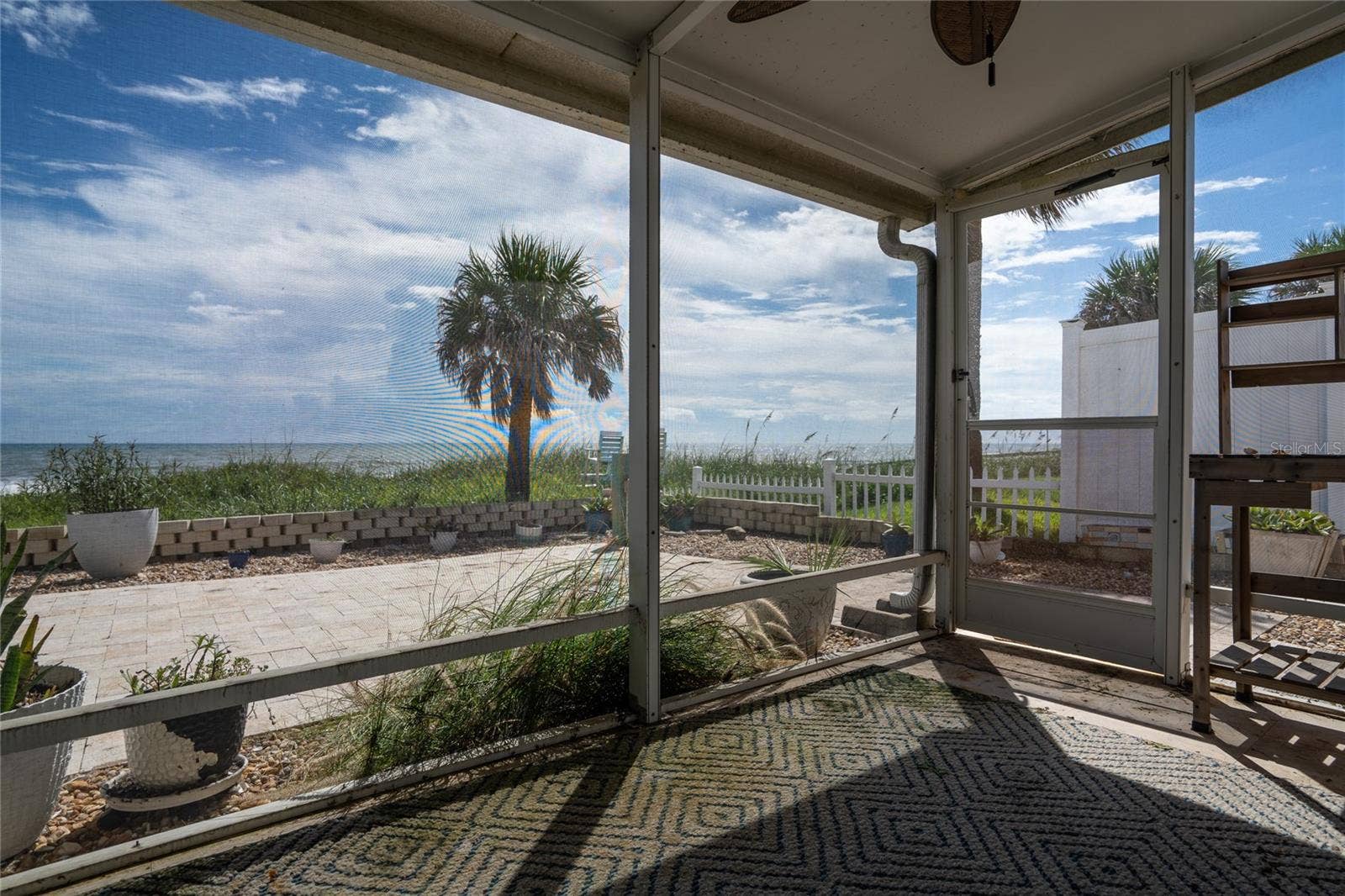 10 OCEAN EDGE DRIVE, Ormond Beach, FL 32176 Screened in patio off primary bedroom and Florida room!