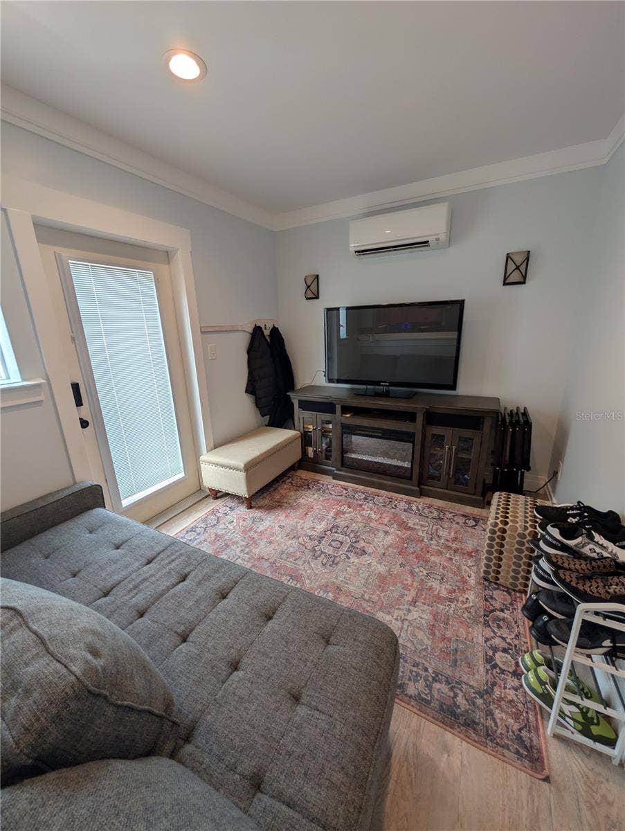 414 JESSAMINE BOULEVARD, Daytona Beach, FL 32118 Apartment living room