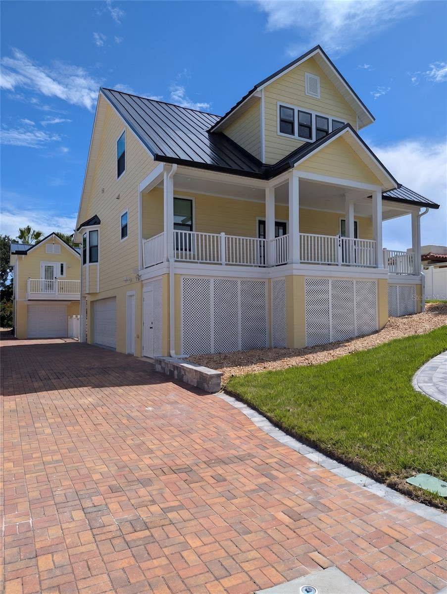 414 JESSAMINE BOULEVARD, Daytona Beach, FL 32118 Main house with apartment house & additional 2 car garage in back