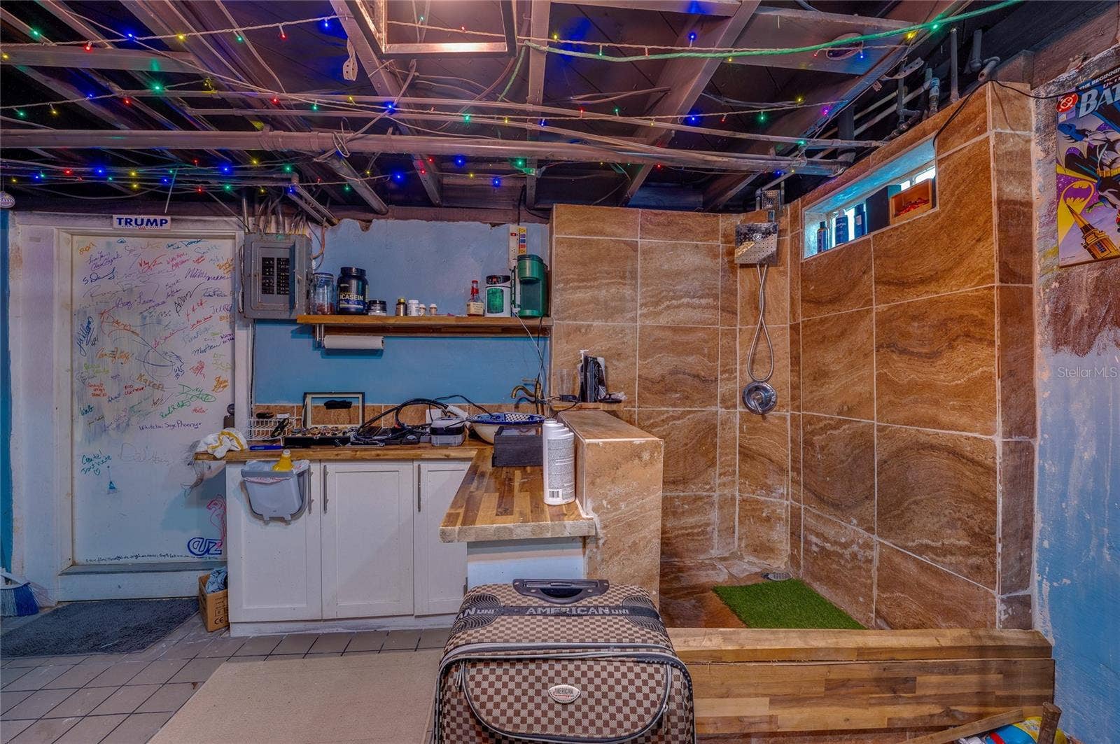 417 N GRANDVIEW AVENUE, Daytona Beach, FL 32118 Basement flex room with sink and shower