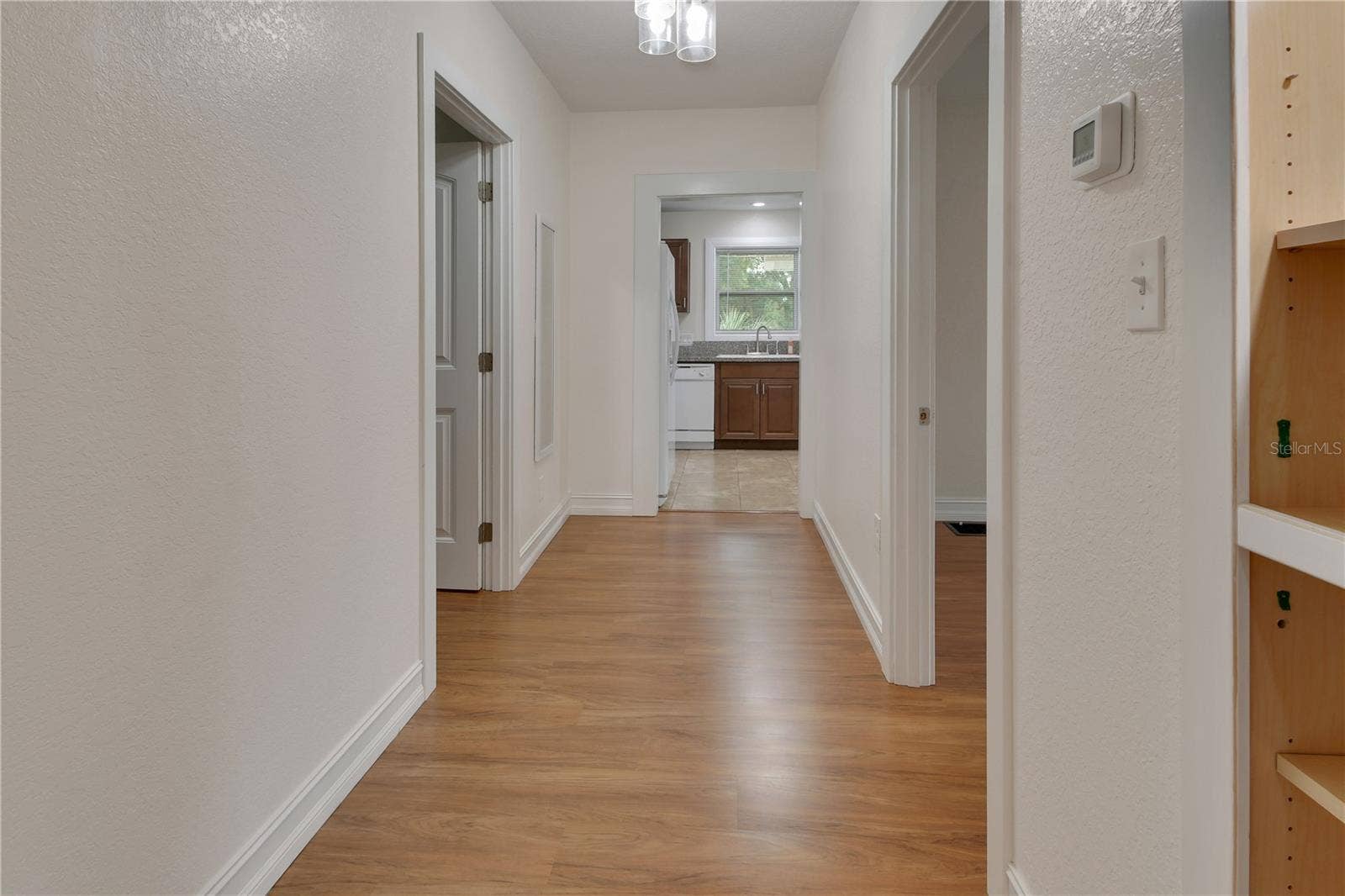 903 E NEW YORK AVENUE, Deland, FL 32724 DOWNSTAIRS HALL