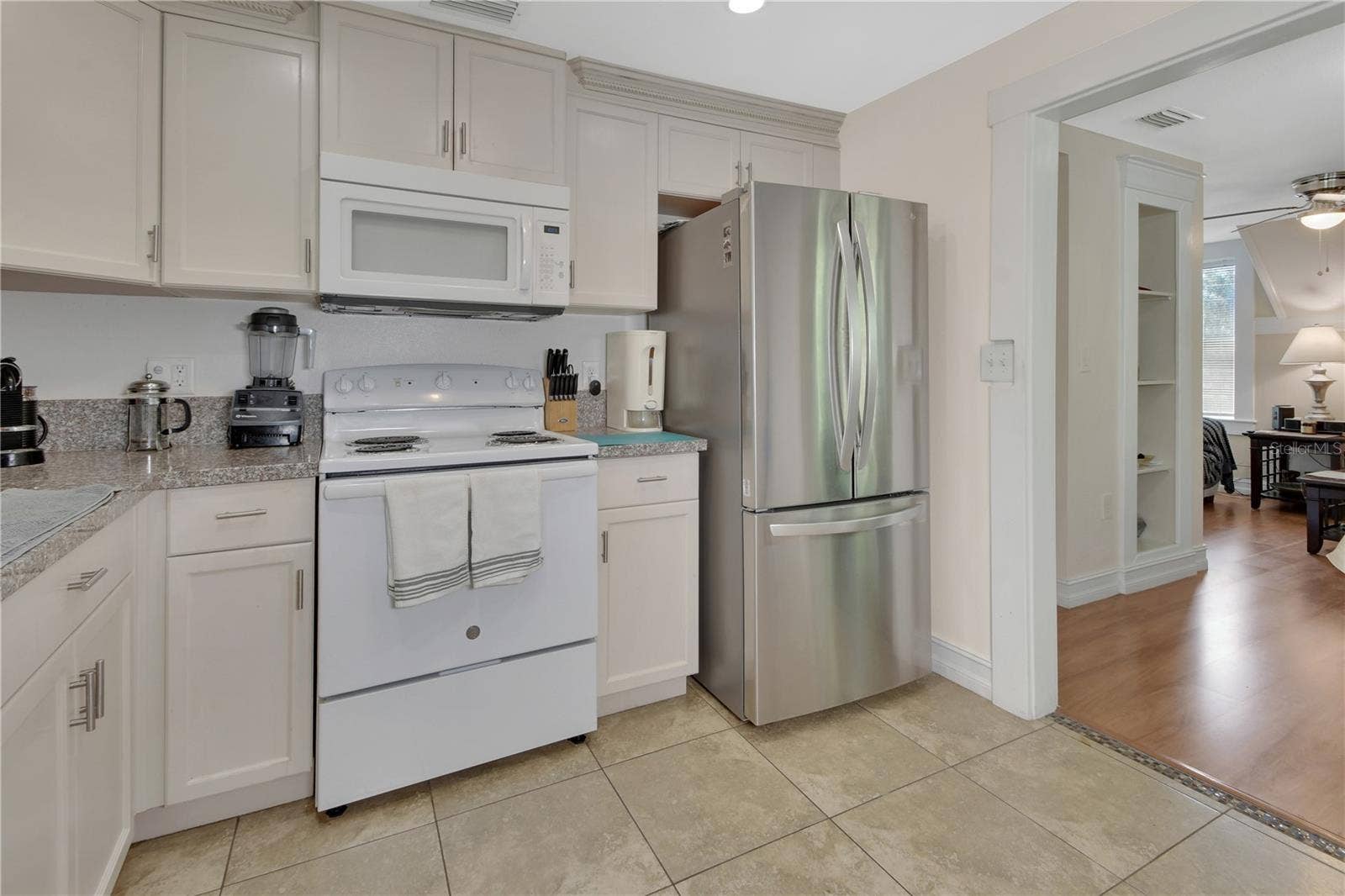 903 E NEW YORK AVENUE, Deland, FL 32724 UPSTAIRS KITCHEN