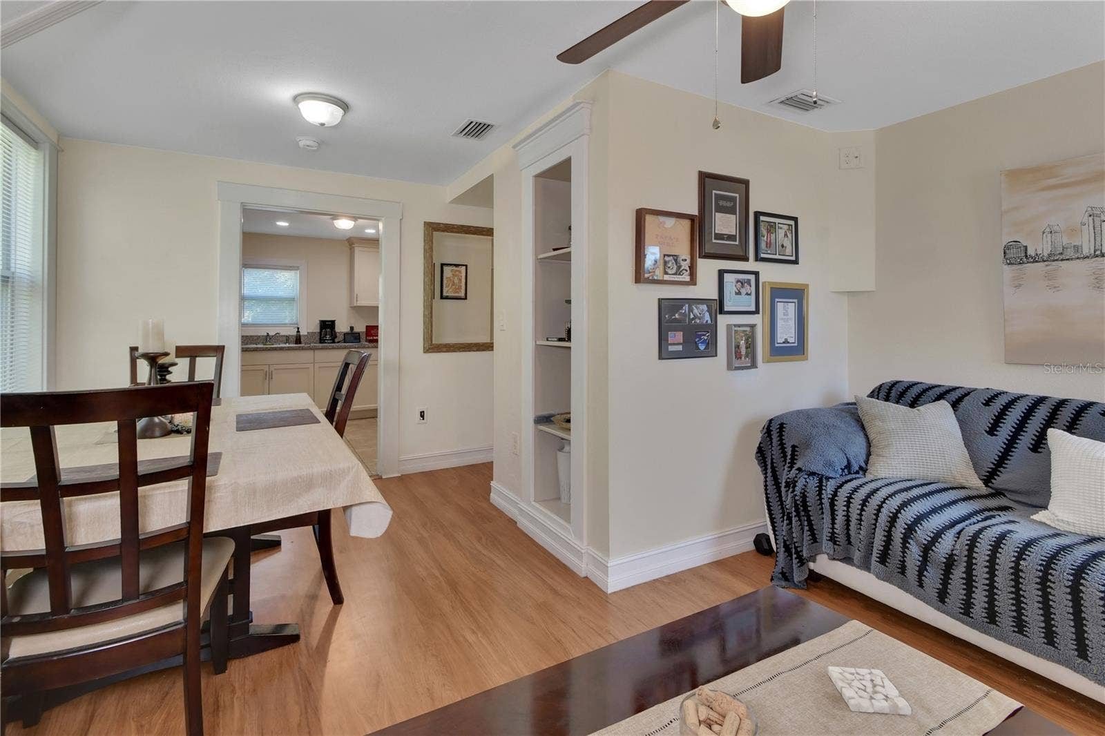 903 E NEW YORK AVENUE, Deland, FL 32724 UPSTAIRS DINING AND LIVING ROOM