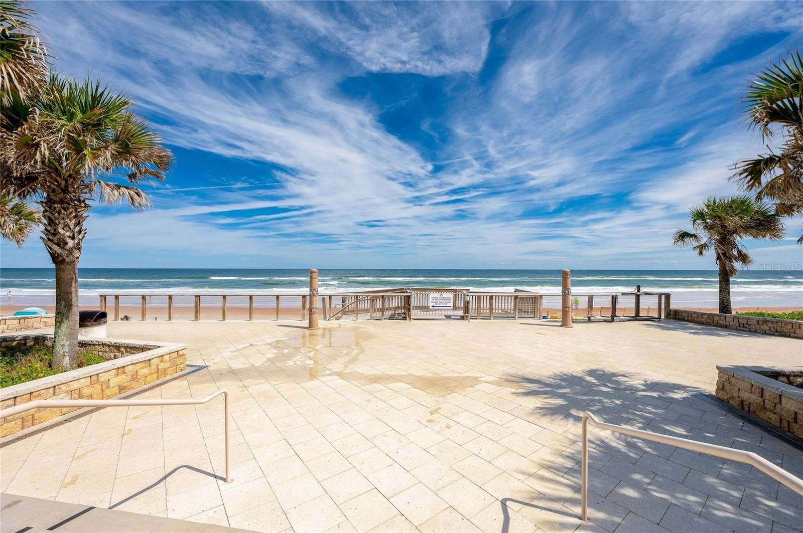 348 WOODLAND AVENUE, Daytona Beach, FL 32118 Expansive view from Andy Romano Beachfront Park showcases direct beach access and sweeping views of the Atlantic Ocean.