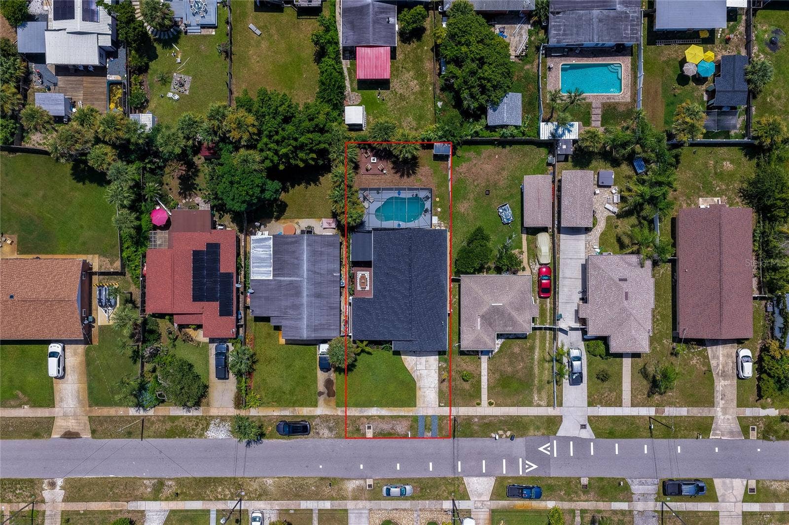 348 WOODLAND AVENUE, Daytona Beach, FL 32118 Direct overhead aerial view mapping out the property boundaries, surrounding residential neighborhood, and lot size.