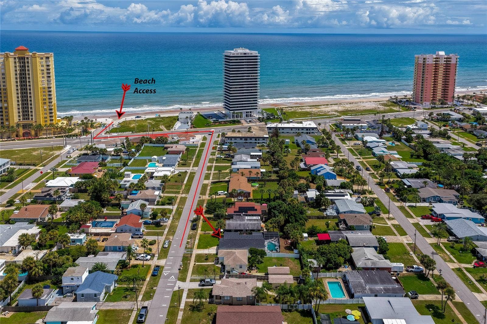 348 WOODLAND AVENUE, Daytona Beach, FL 32118 Aerial neighborhood photo with annotated directions showing the quick, direct route down the street to local beach access.