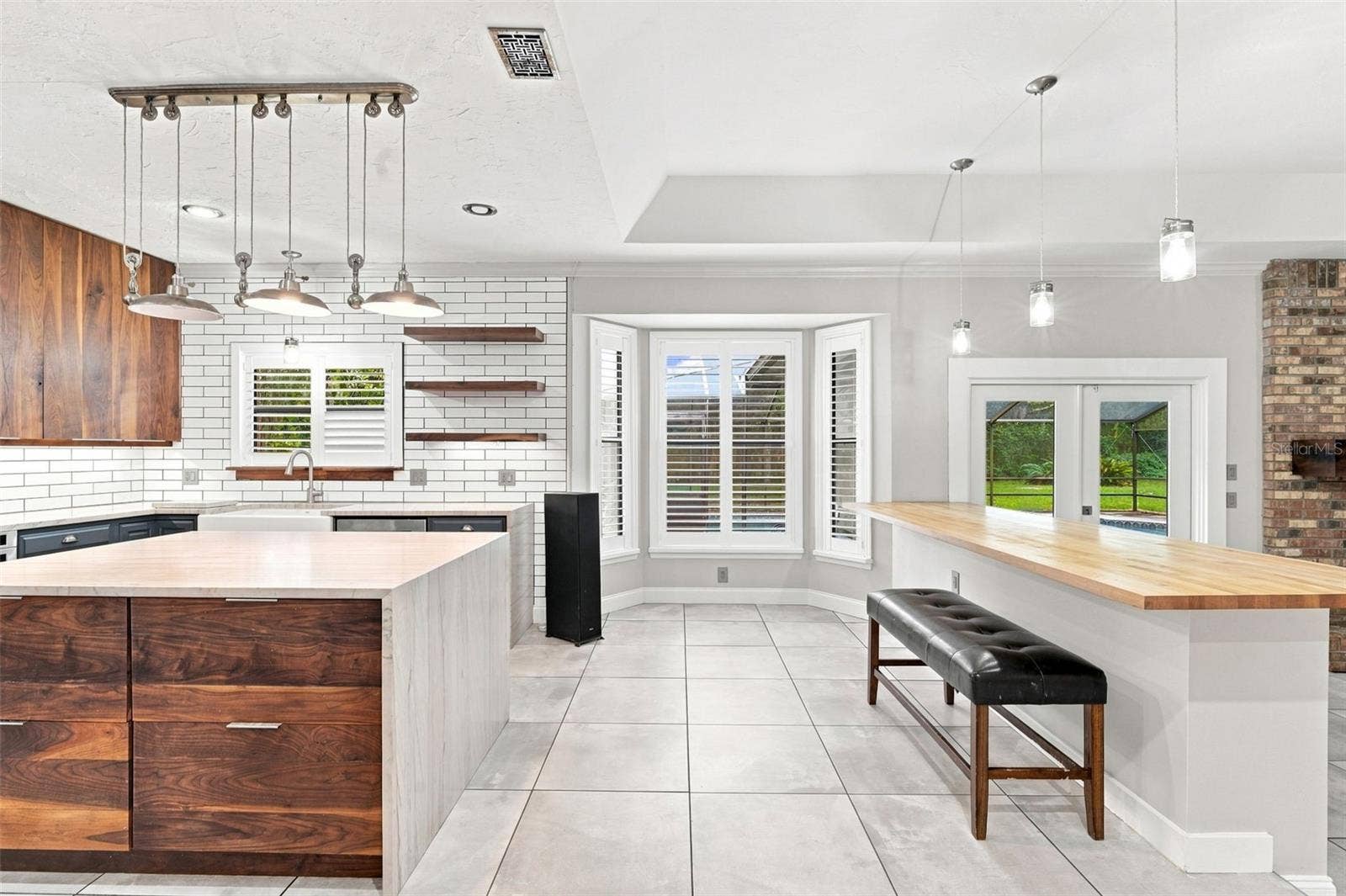 1530 W BERESFORD ROAD, Deland, FL 32720 KITCHEN WITH BAR SEATING