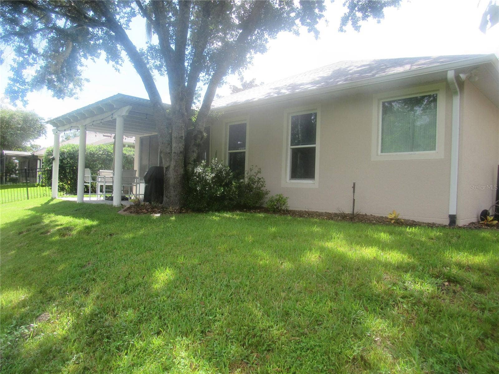 506 HERON POINT WAY, Deland, FL 32724 FENCED REAR YARD OVERLOOKING CONSERVATION AREA