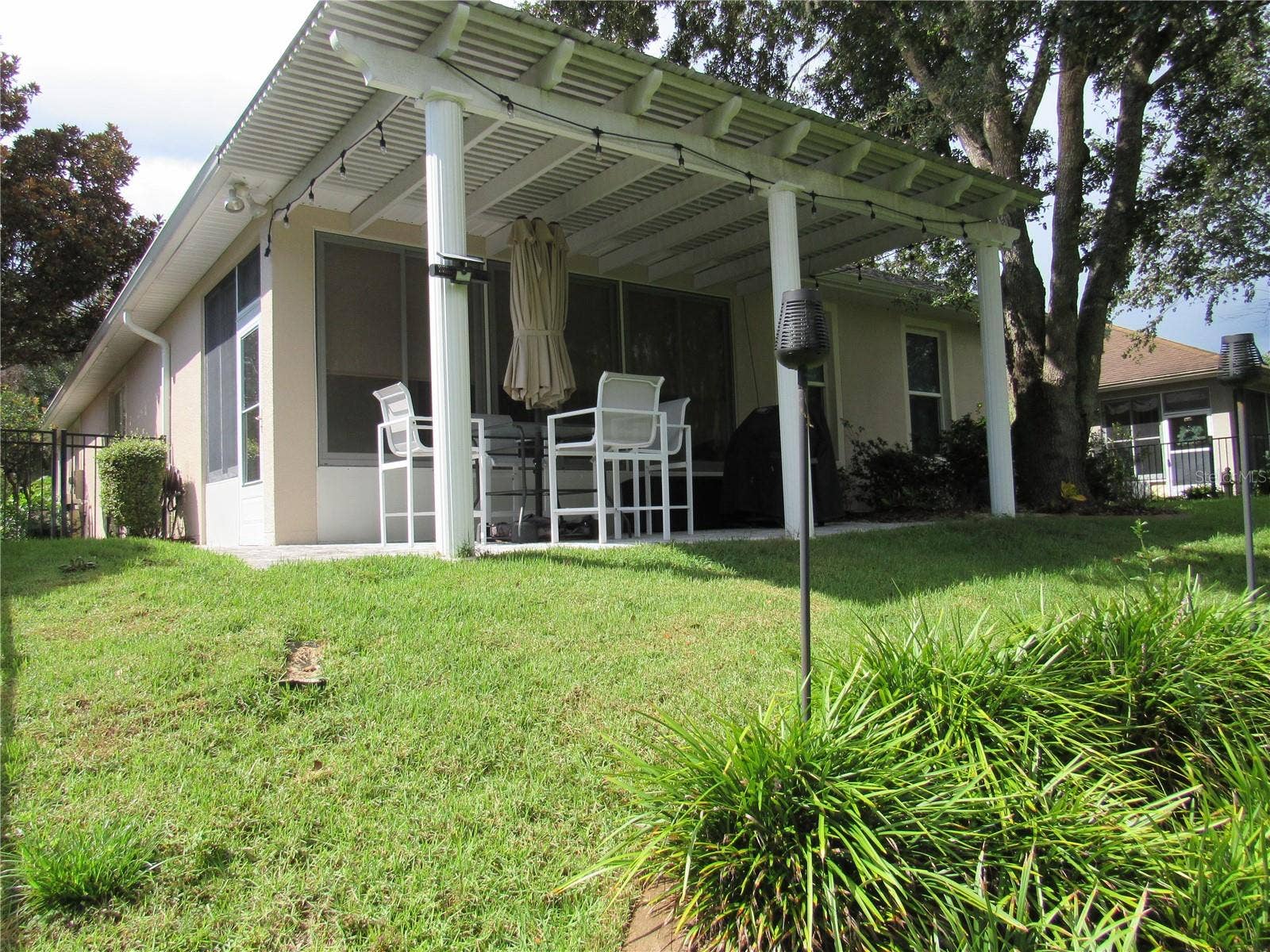 506 HERON POINT WAY, Deland, FL 32724 REAR YARD COVERED PATIO