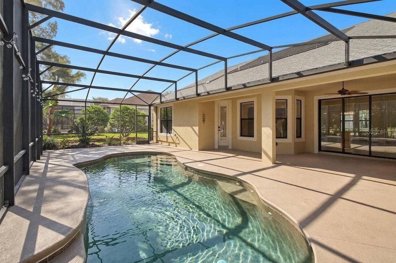 502 VICTORIA HILLS DRIVE, Deland, FL 32724 Screened in pool and patio