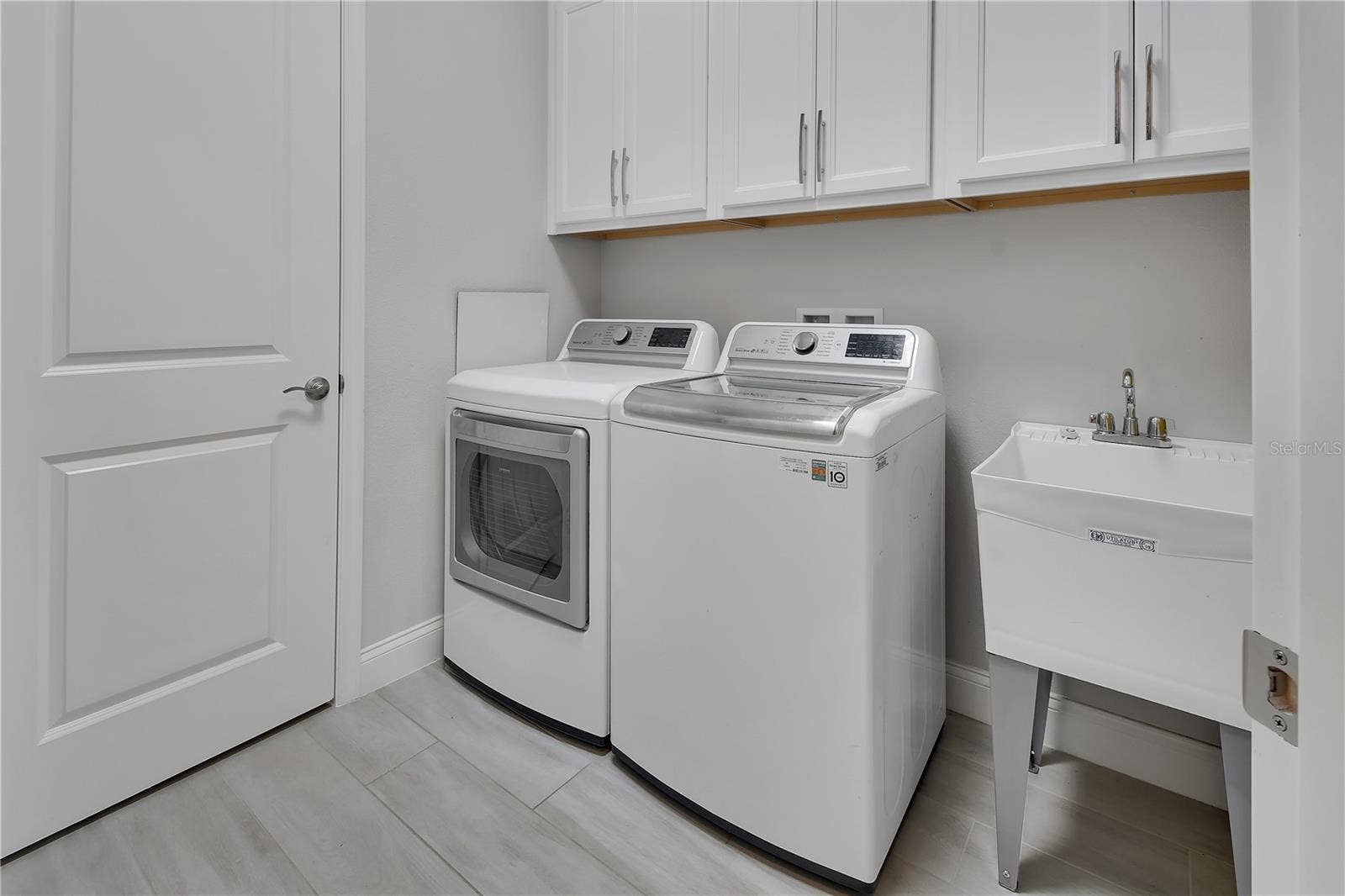 Laundry room with secondary pantry/closet