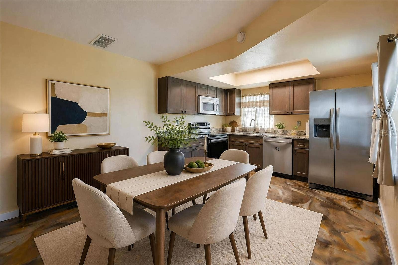 36 SPRINGWOOD SQUARE, Port Orange, FL 32129 Virtually Staged - Functional kitchen equipped with stainless steel appliances, dark wooden cabinetry, granite countertops, and epoxy flooring.