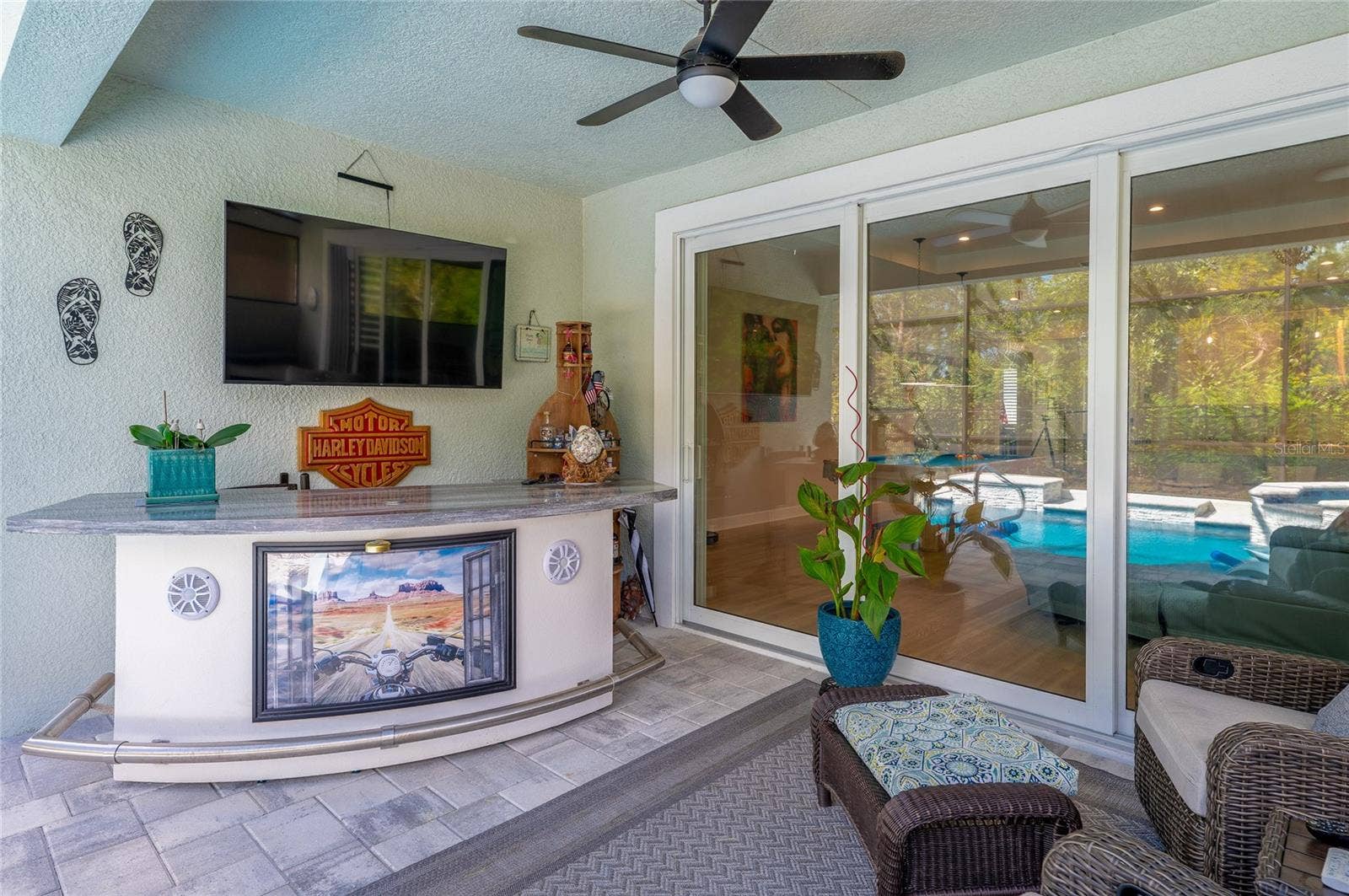 1254 VENICE COURT, Deland, FL 32724 TV on lanai