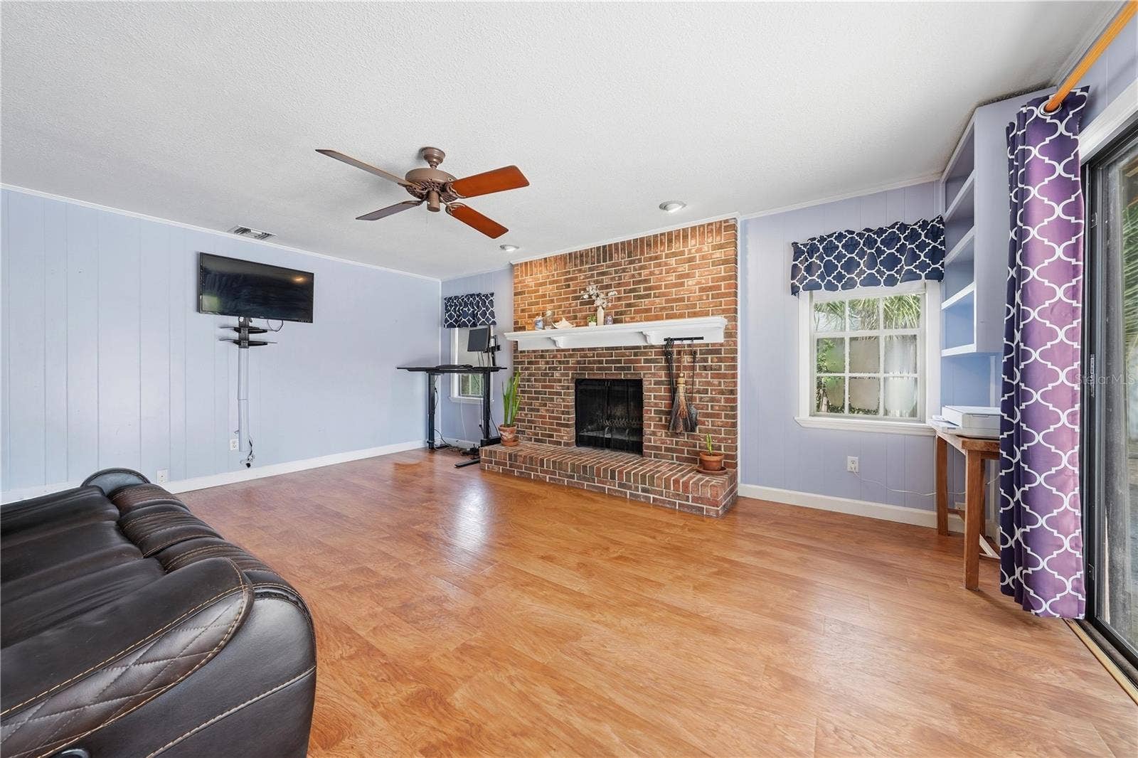 769 TORCHWOOD DRIVE, Deland, FL 32724 FAMILY ROOM WITH FIREPLACE