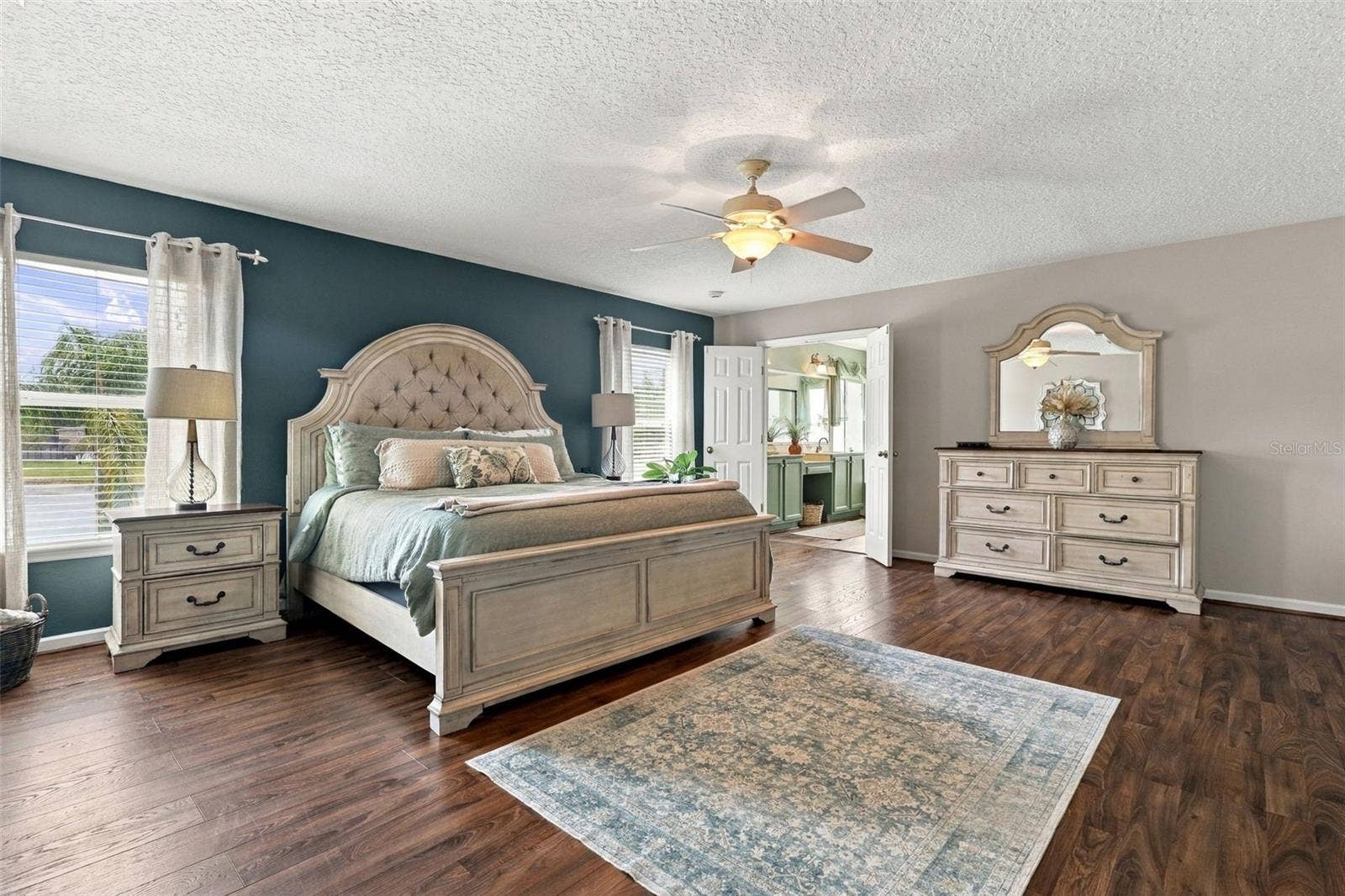 8 ANGELA DRIVE, Palm Coast, FL 32164 Primary bedroom suite towards ensuite bath.