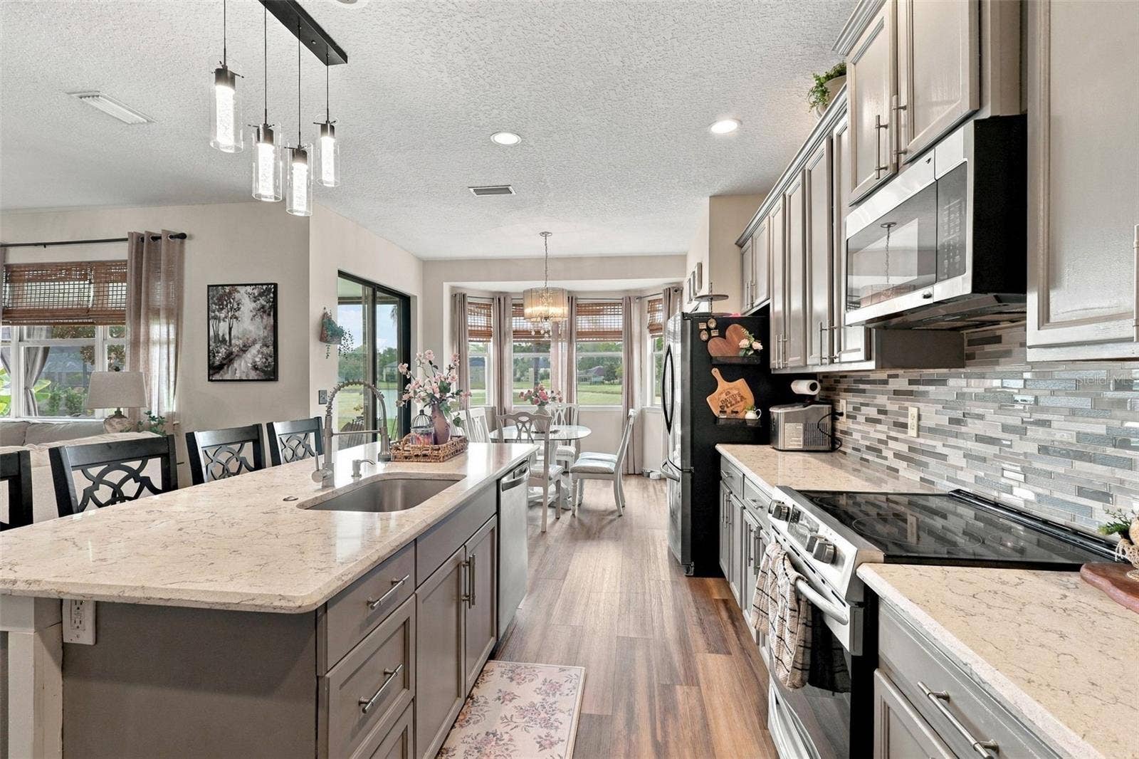8 ANGELA DRIVE, Palm Coast, FL 32164 Stainless steel appliances convey and look at how much storage these 42" upper cabinetry offers!!