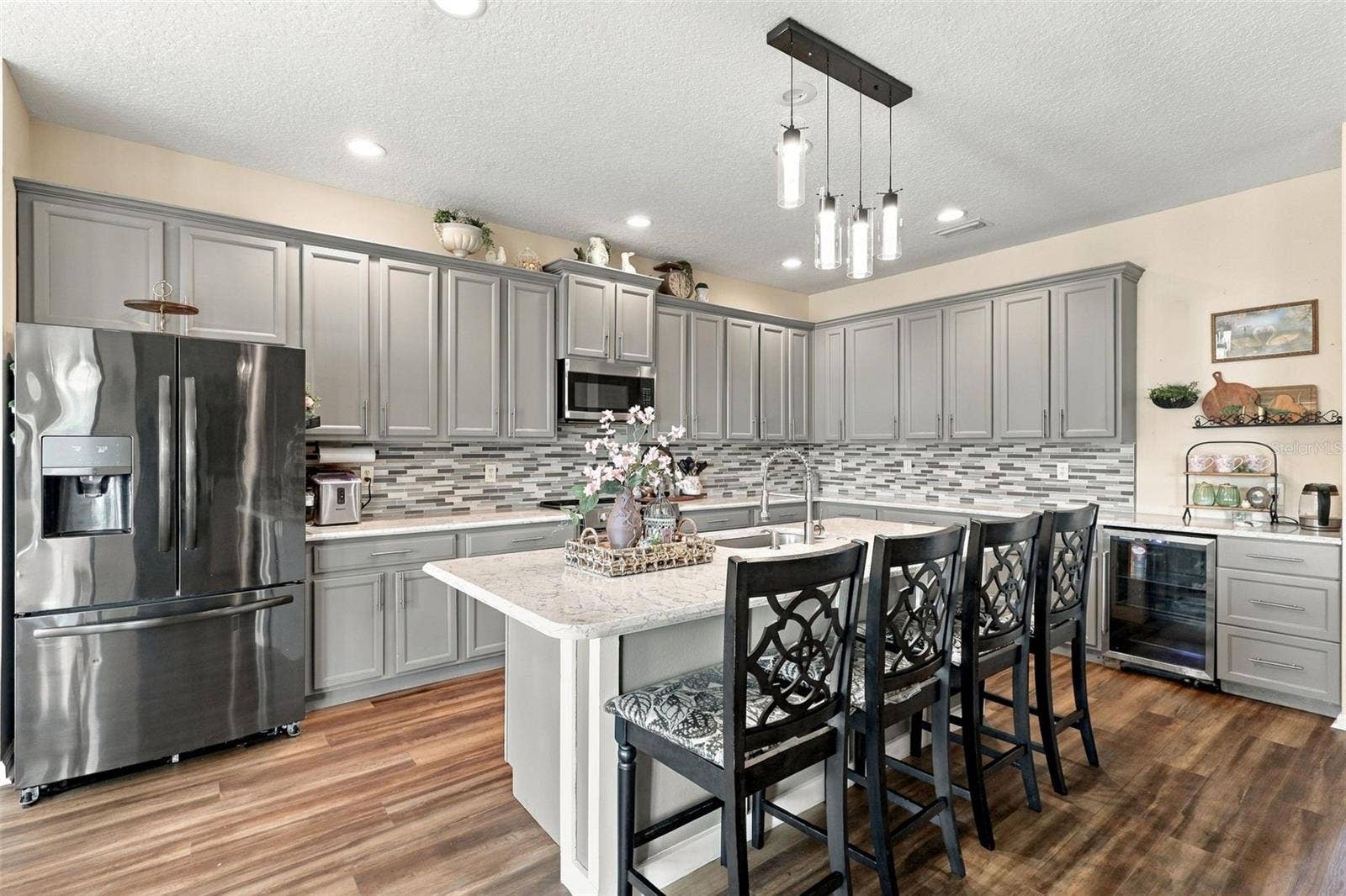 8 ANGELA DRIVE, Palm Coast, FL 32164 Look at this gorgeous updated kitchen with custom tile backsplash and quartz countertops.