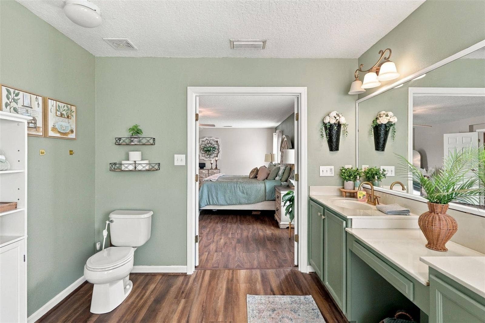 8 ANGELA DRIVE, Palm Coast, FL 32164 Ensuite bath towards primary bedroom.
