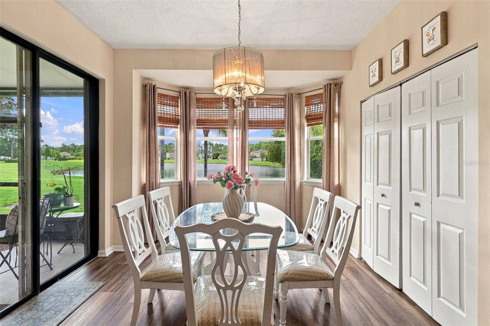 8 ANGELA DRIVE, Palm Coast, FL 32164 Enjoy the views of the pond from this dining area. Huge pantry at right.
