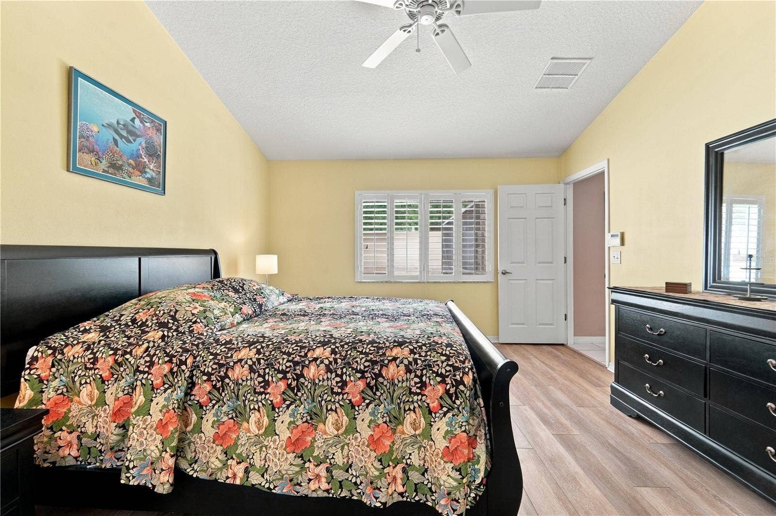 1420 BENT OAKS BOULEVARD, Deland, FL 32724 Primary bedroom with luxury vinyl plank flooring.